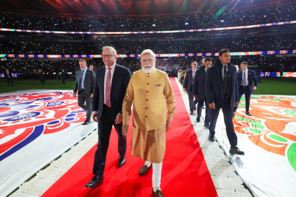 Prime Minister Narendra Modi waves to a massive gathering of around 30,000 members of the Indian diaspora at a community event in Melbourne, Australia.